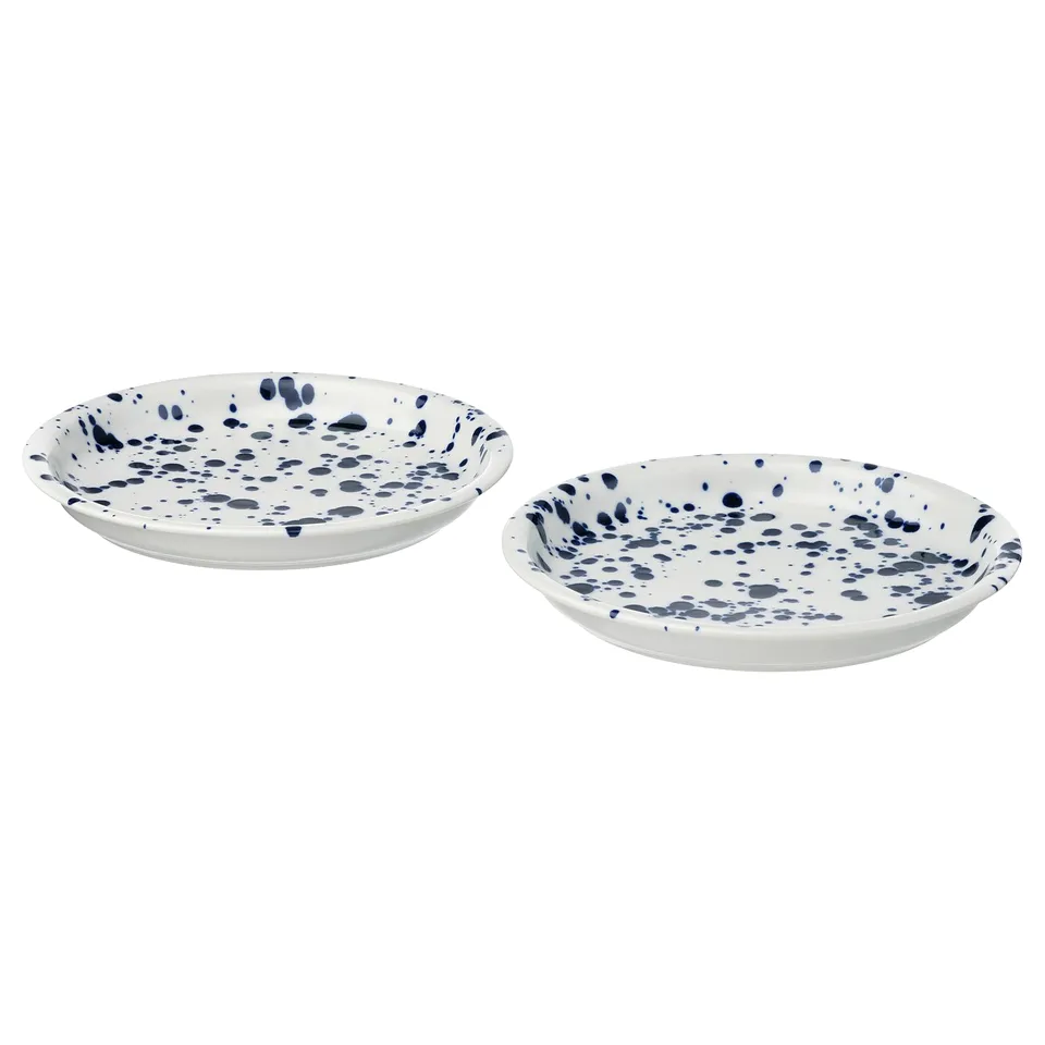 Two white plates with blue speckles, round shape, easy-grip edges, made of stoneware.