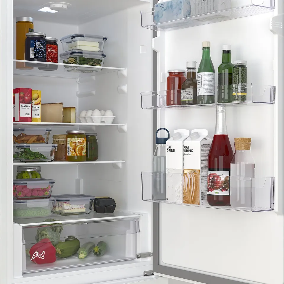 Fridge with adjustable storage, integrated lights, and customizable shelving.