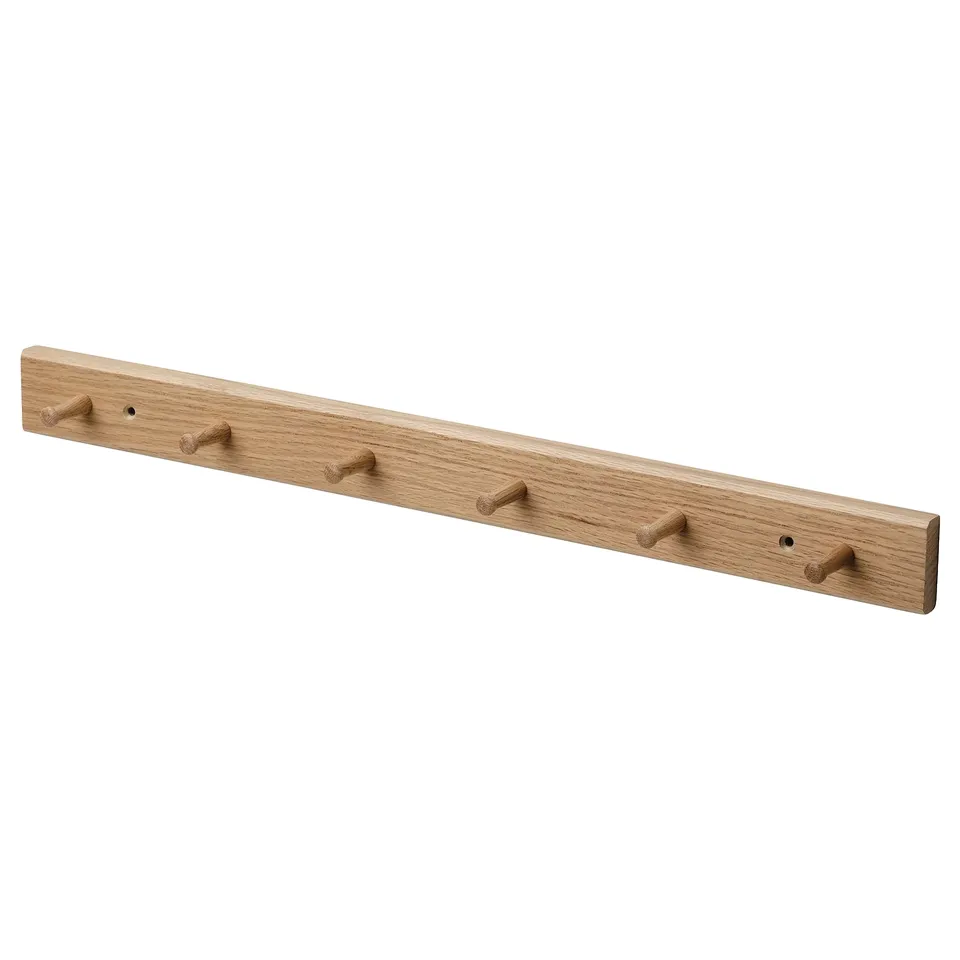 HÖVOLM wooden coat rack, light brown, rectangular, with six hooks.