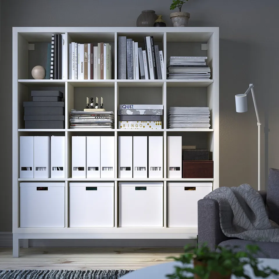 KALLAX white shelving unit, large, holds books, boxes, and decor, fits room corner, modern design.