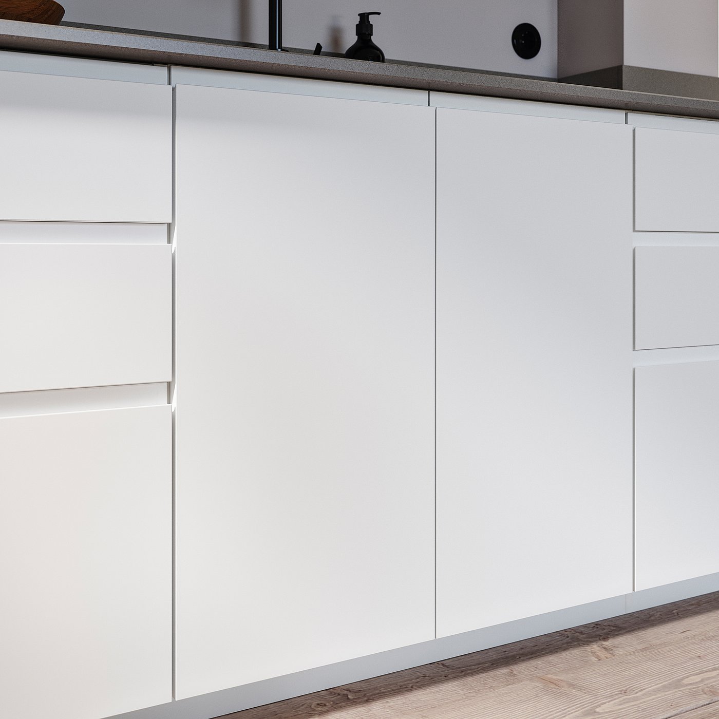 Modern white kitchen cabinets with minimalist integrated handles.