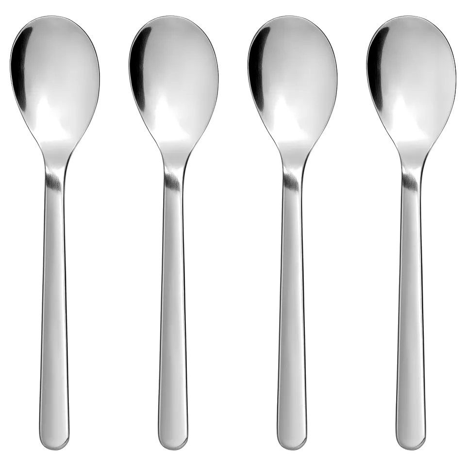 Four shiny silver FÖRNUFT teaspoons, sleek and simple, arranged in a row on white background, stainless steel, elegant design.