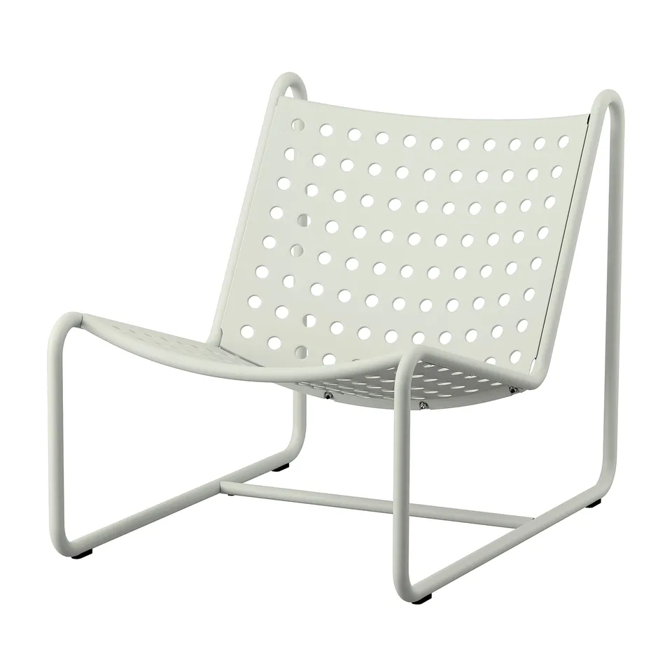 SKOGSÖN white metal chair, perforated seat, rounded shape.