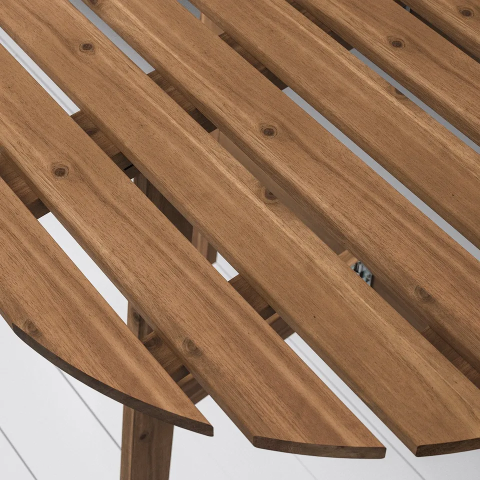 Wooden outdoor table; high-quality acacia wood, visibly durable with natural grain patterns. Foldable design for space-saving.