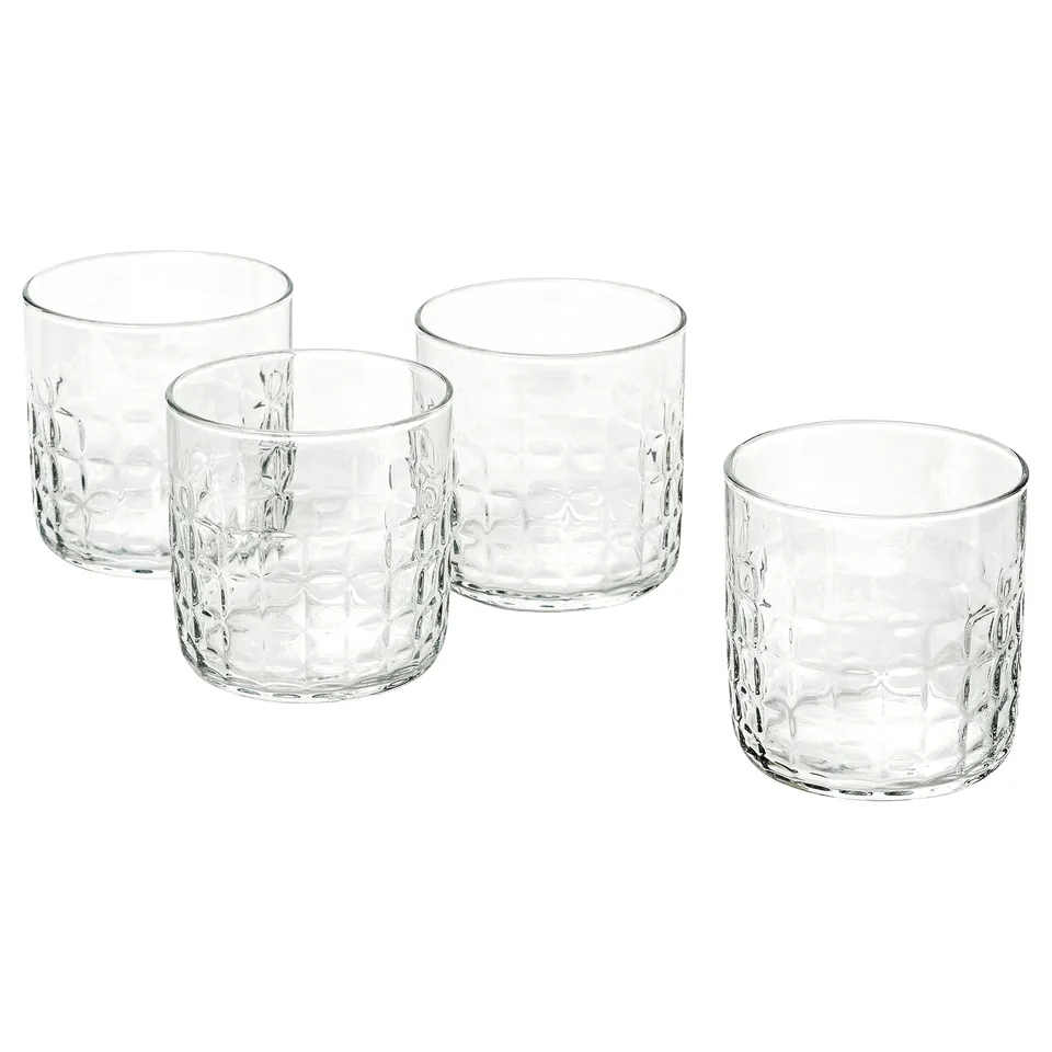 Faceted glass cups, diamond-patterned, for drinks or desserts, casual/formal.