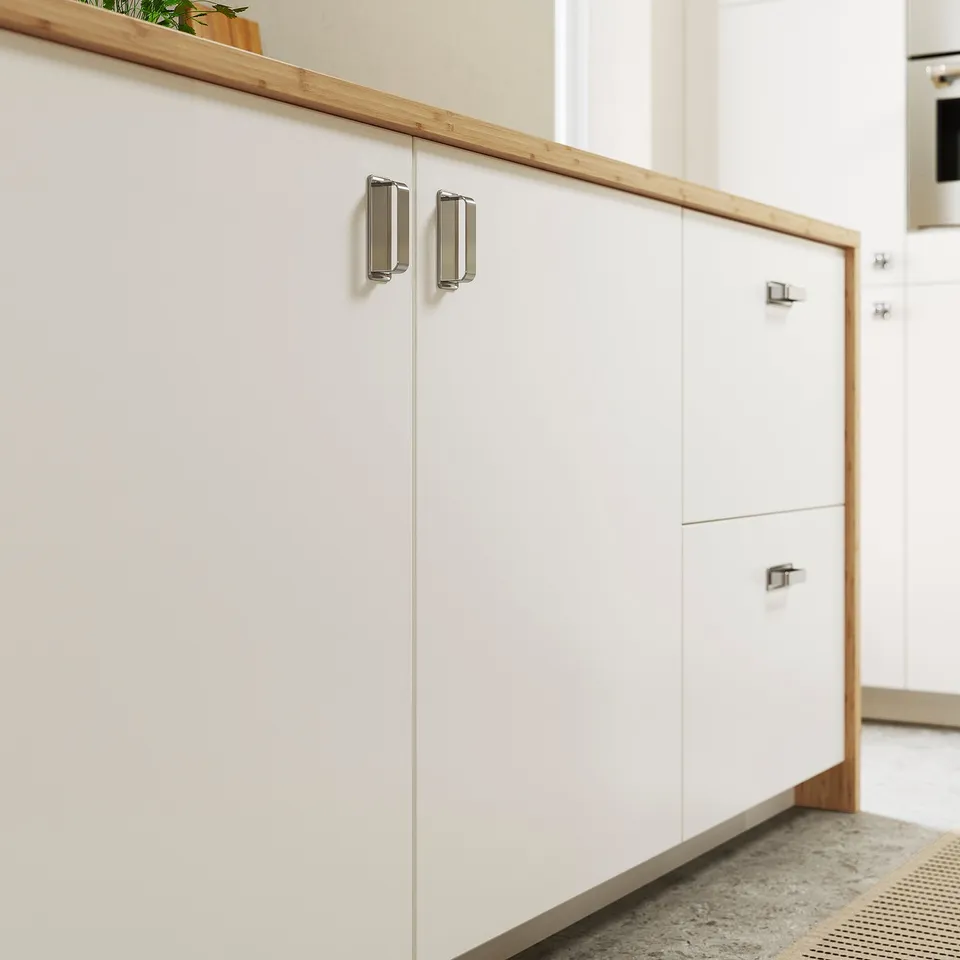 White kitchen cabinets, modern design, clean lines, stainless handles.