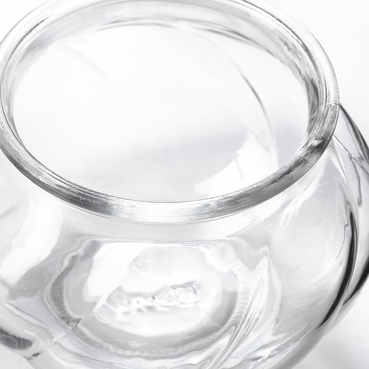 Clear, glass vase shown from above. Smooth, transparent design highlights quality.