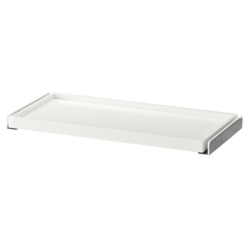White KOMPLEMENT pull-out tray, rectangular, smooth surface, fiberboard and plastic edging, ideal wardrobe accessory.