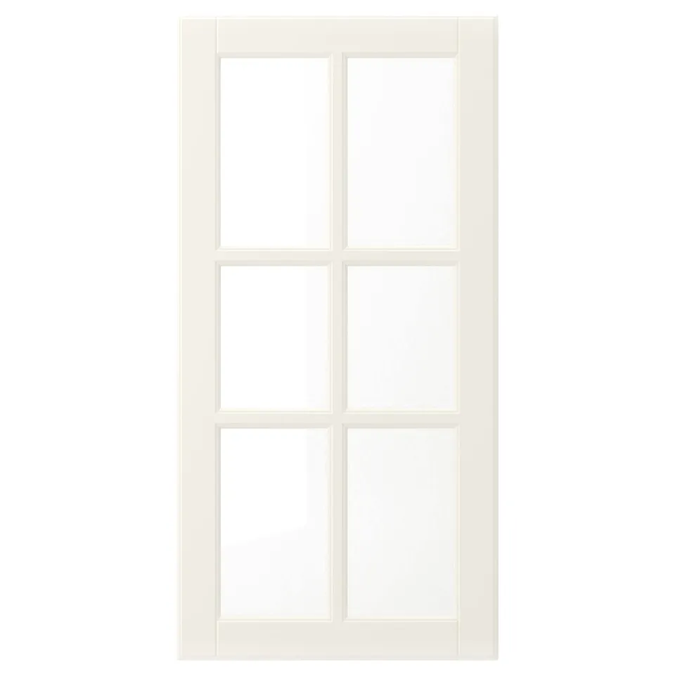 A white BODBYN cabinets door with bevelled panels for a classic look. Made from painted wood and glass, it a smooth, easy-to-clean surface.