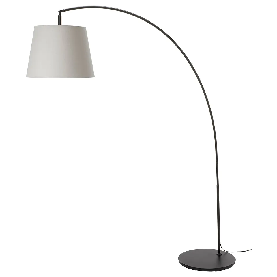 SKOTTORP black arched floor lamp with white shade. Modern minimalist design. Flexible, space-saving.