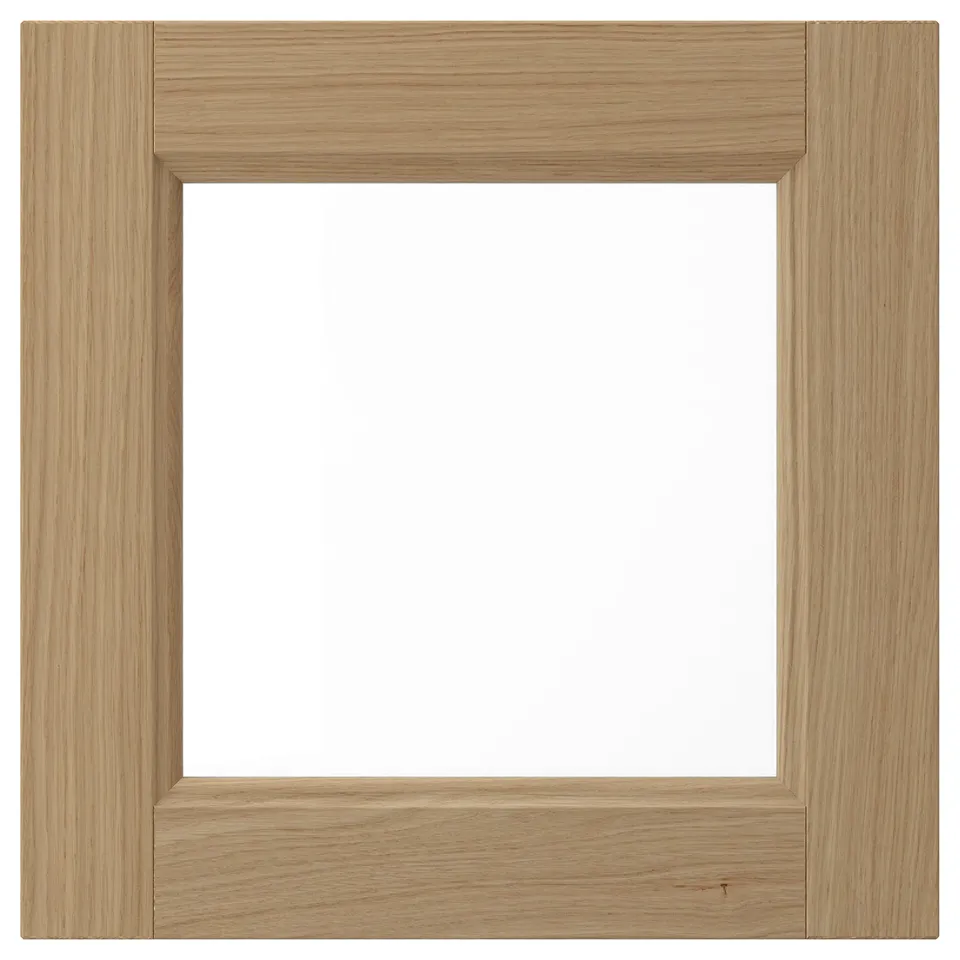 This image VEDHAMN wooden kitchen cabinet doors with a natural oak finish, fitted with glass panels; showcasing a simple, elegant, and durable design.
