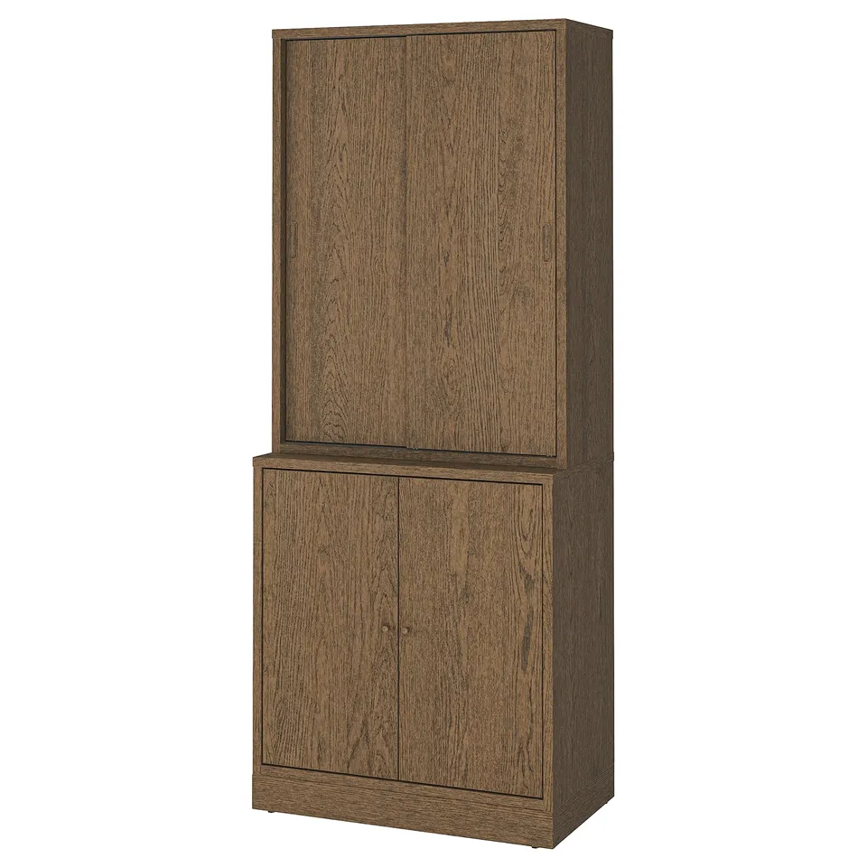 A TONSTAD cabinet in brown wood, featuring two sections with soft-close doors and adjustable shelves, combining classic and elegant design.