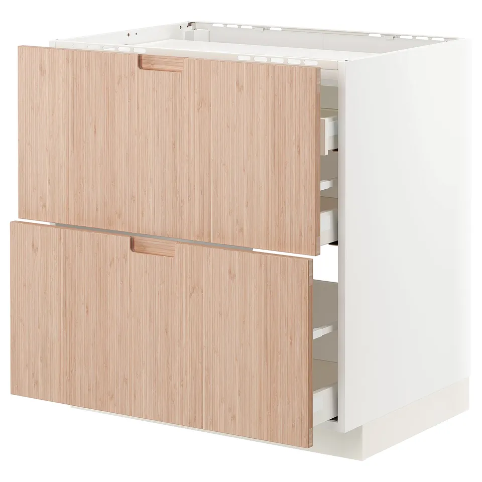 Modern kitchen unit METOD with bamboo drawers. Soft close feature, sturdy white frame, and natural wooden handles.