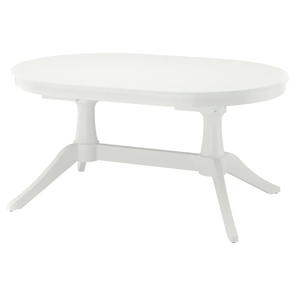 ROSENTORP extendable oval dining table in white. Classic design with double pedestal base and self-storing leaf.