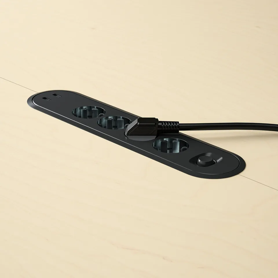 Black table power outlet, usb port, and cable organiser.