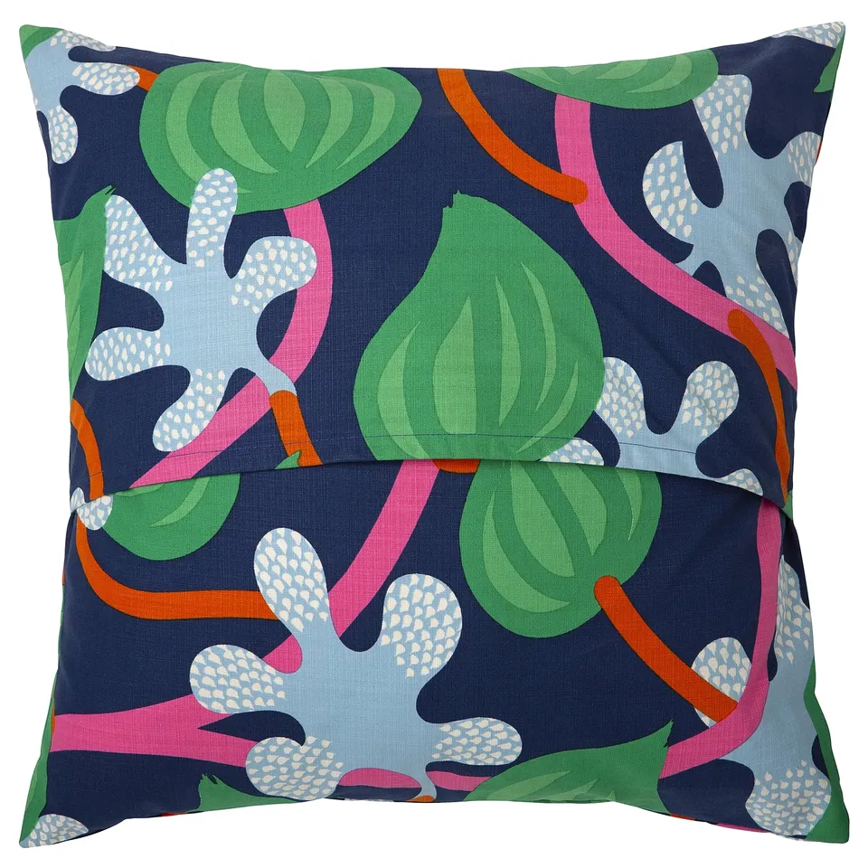 MÄVINN cushion cover: blue with green leaves, pink vines, hand-stitched caterpillar, square.