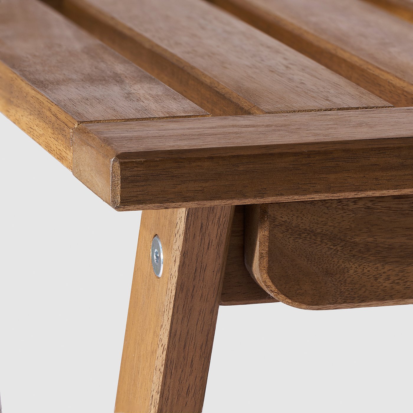 Close-up of solid acacia wood table, showcasing smooth, polished surface and sturdy construction.