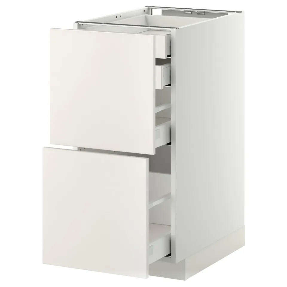 A white METOD kitchen cabinet with two drawers and a door. It a modern design with clean lines and smooth surfaces.