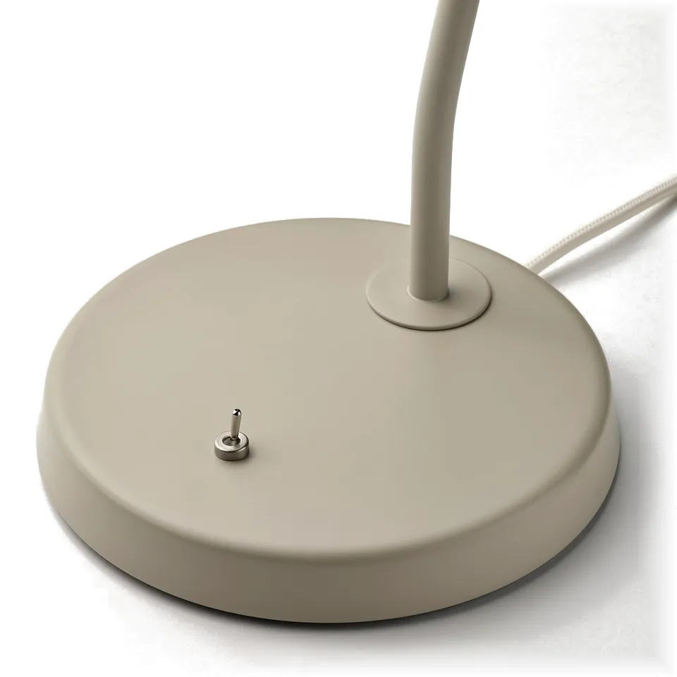 Modern beige desk lamp base with adjustable stand, simple design, sleek finish.