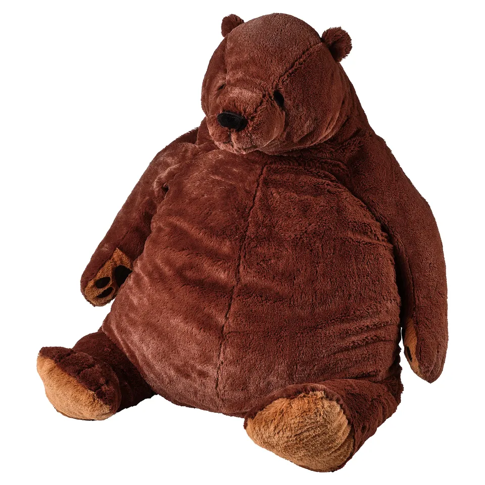 Large brown teddy bear, soft plush, sitting with arms open, made of polyester.