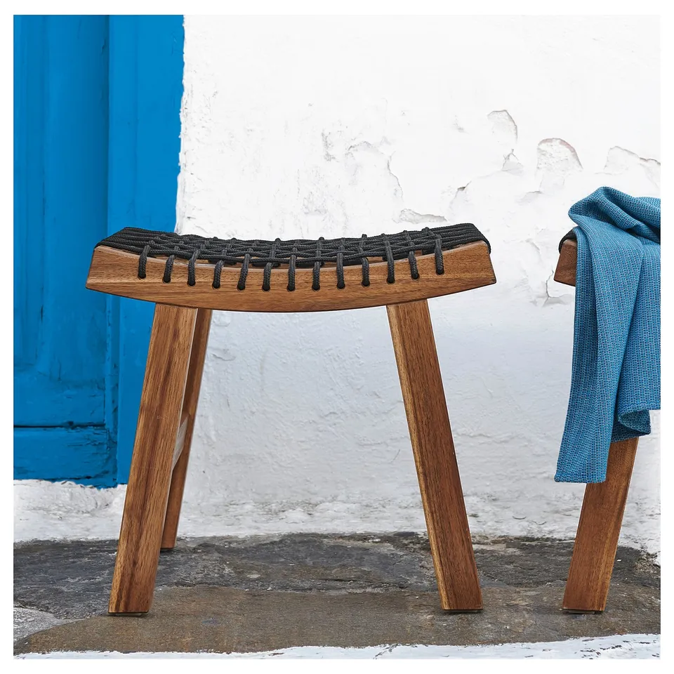 STACKHOLMEN wooden outdoor stool, light brown with black rope seat.