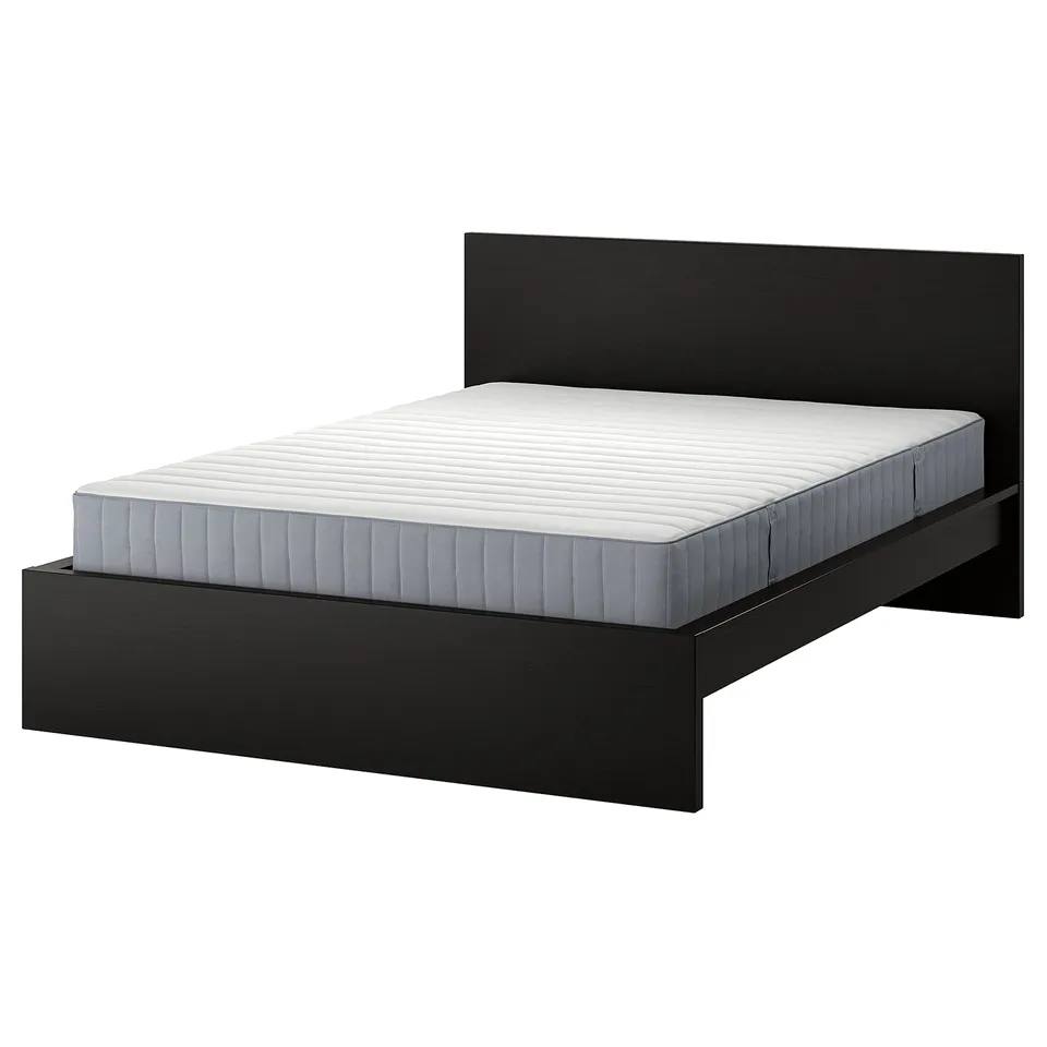Modern black bed frame with grey quilted mattress, sleek design, and high headboard.