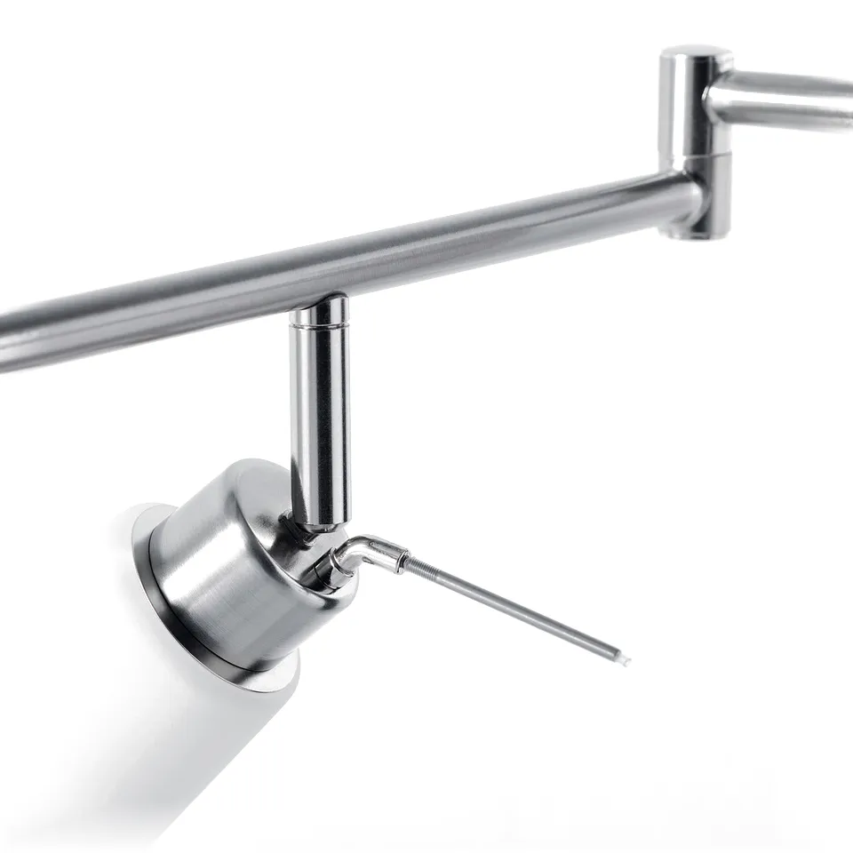 Stylish metal ceiling spot with adjustable nickel-plated track, demonstrating high-quality finish and durable design.
