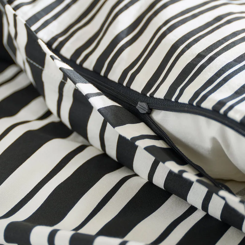 Black and white striped duvet cover with zip. Soft, playful zebra pattern.