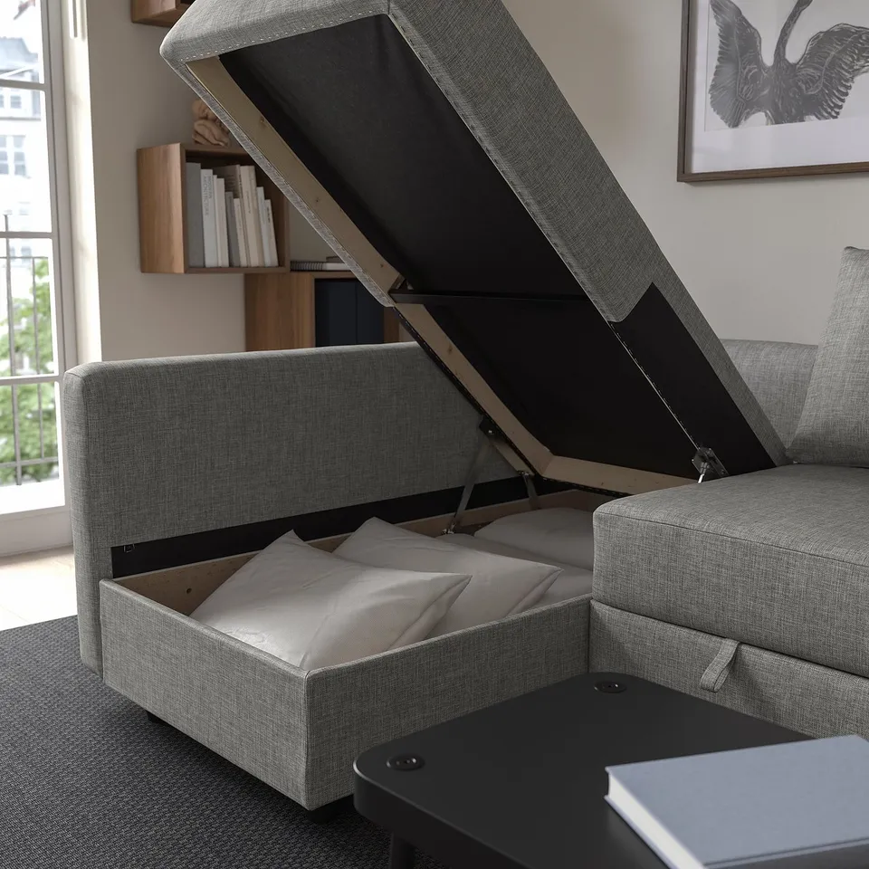 Modern sofa with storage and built-in mattress, converts to bed.