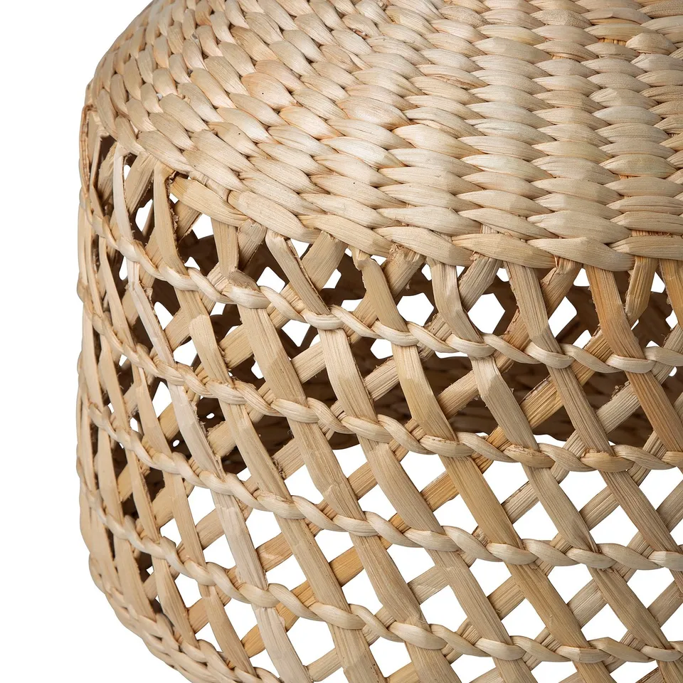 Train-woven lampshade, natural banana fibres, intricate weave pattern, round shape.