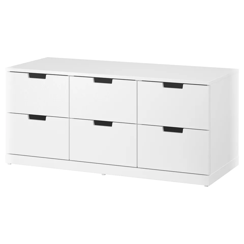 White NORDLI 6-drawer chest; modern, minimalist, rectangular, wooden drawers with black handles.