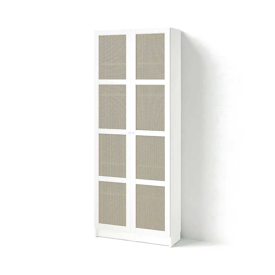 White BILLY bookcase with perforated doors, minimalist design.