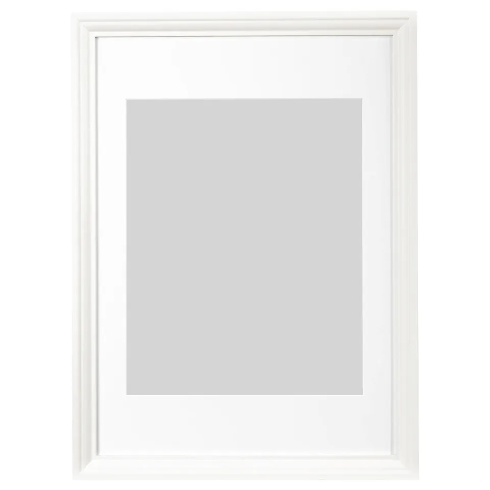 Empty white picture frame, rectangular shape with smooth edges, ready for wall mounting.