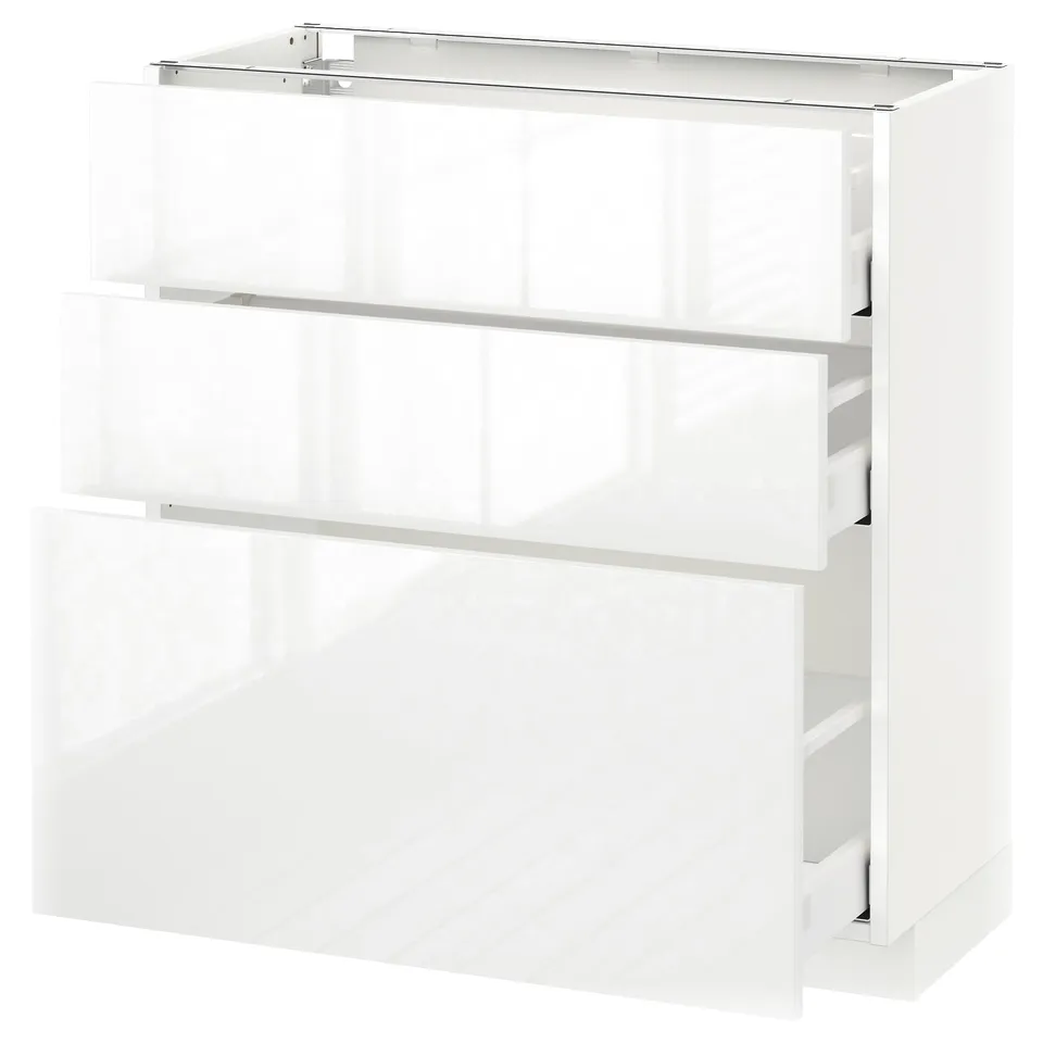 White glossy kitchen cabinet with three drawers and glass top.