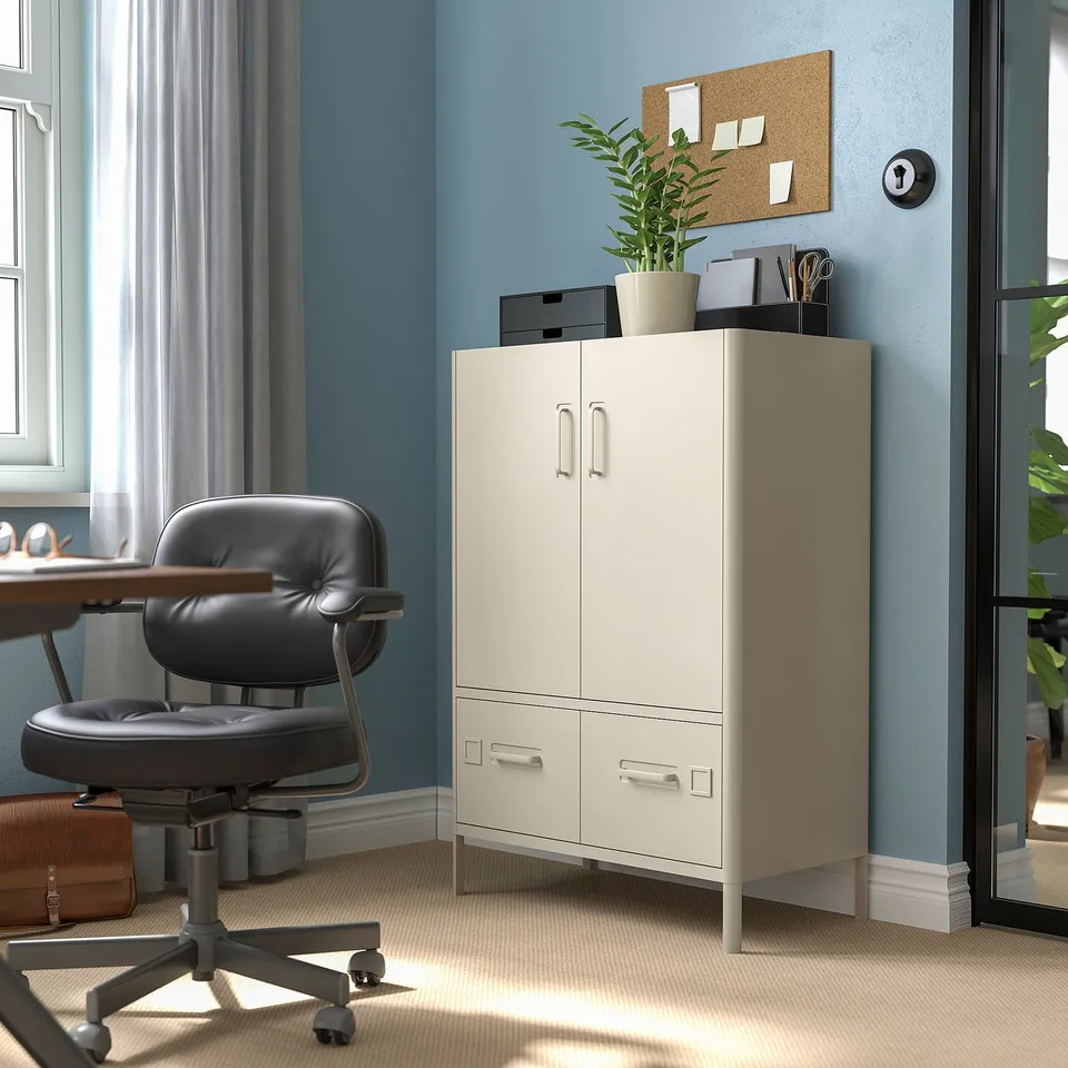 Beige IDÅSEN office cabinet with 2 cabinets & drawers,-fit corner desk & chair setup.