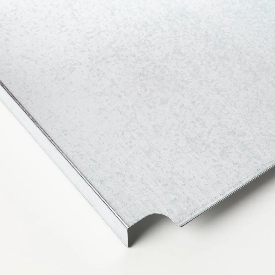 Galvanised steel shelf with smooth surface and rounded edges, showcasing high-quality material and design.