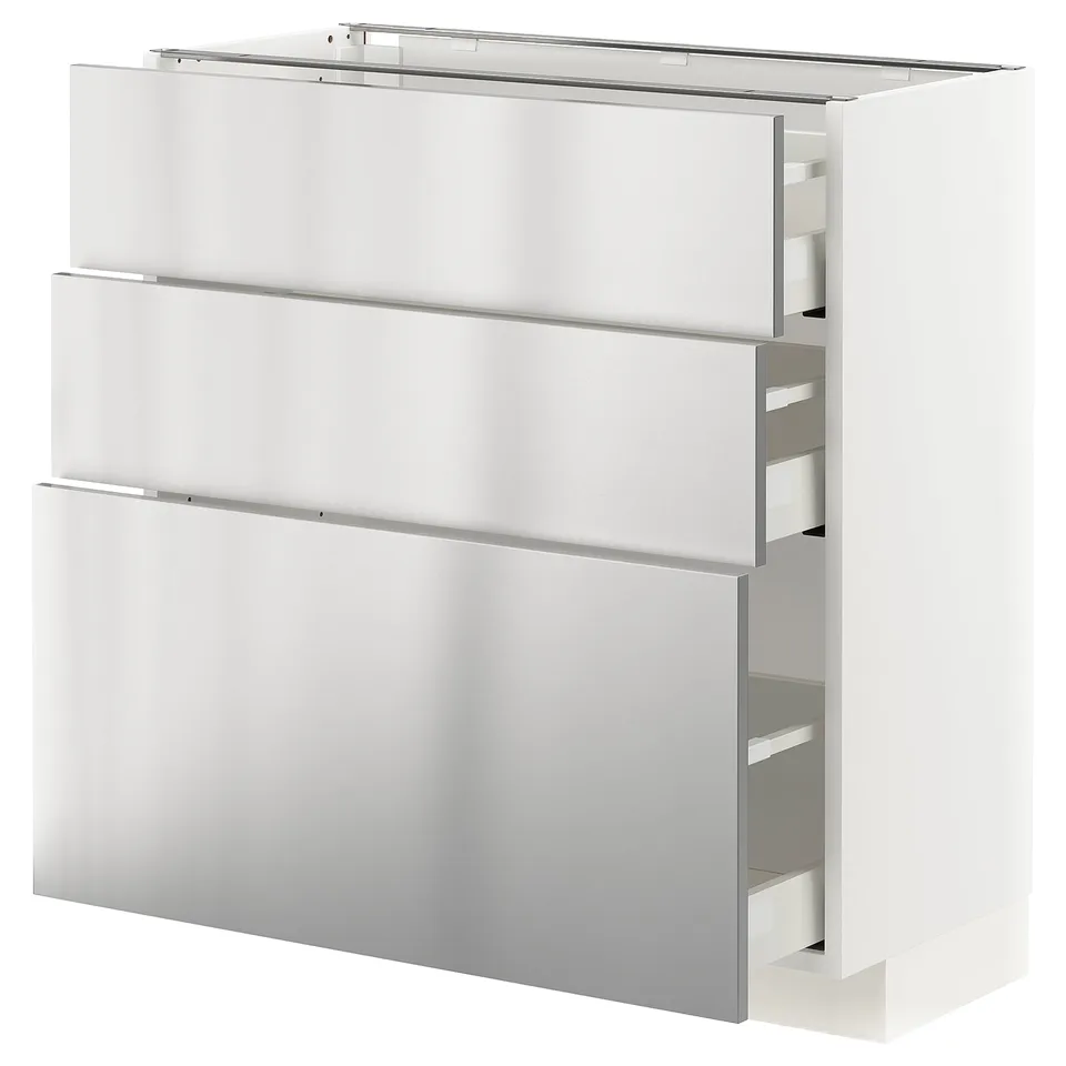 A white METOD kitchen unit with stainless steel drawers, featuring a sleek, modern design.