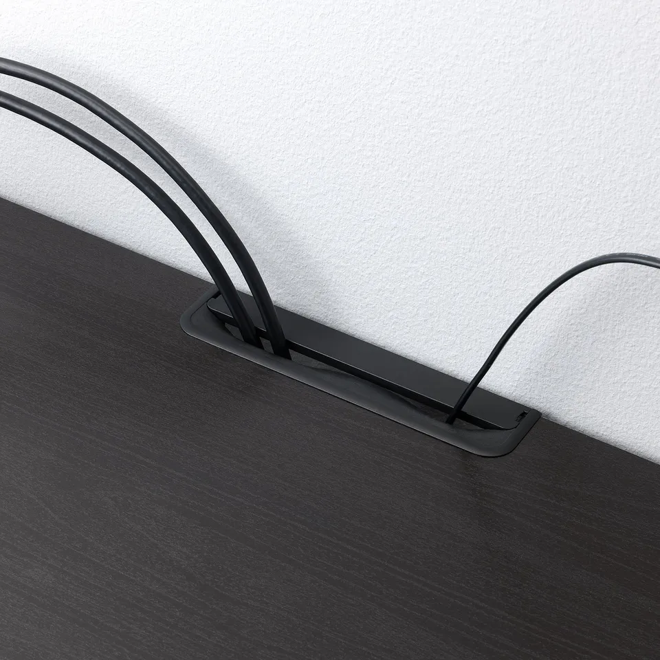 Modern black tv bench with adjustable shelves and cable outlets, keeping media organised and cords hidden.