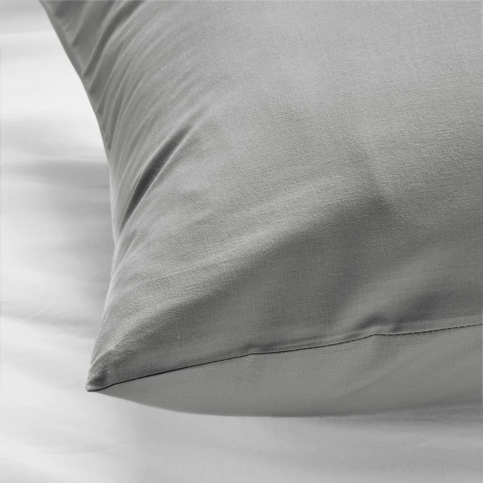 Soft, pure cotton pillowcase close-up, showcasing smooth texture and quality stitching.