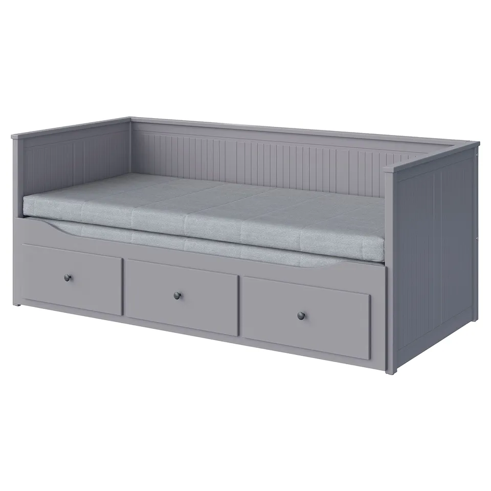 Grey day-bed with foam mattress, three drawers, and vertical panel design.