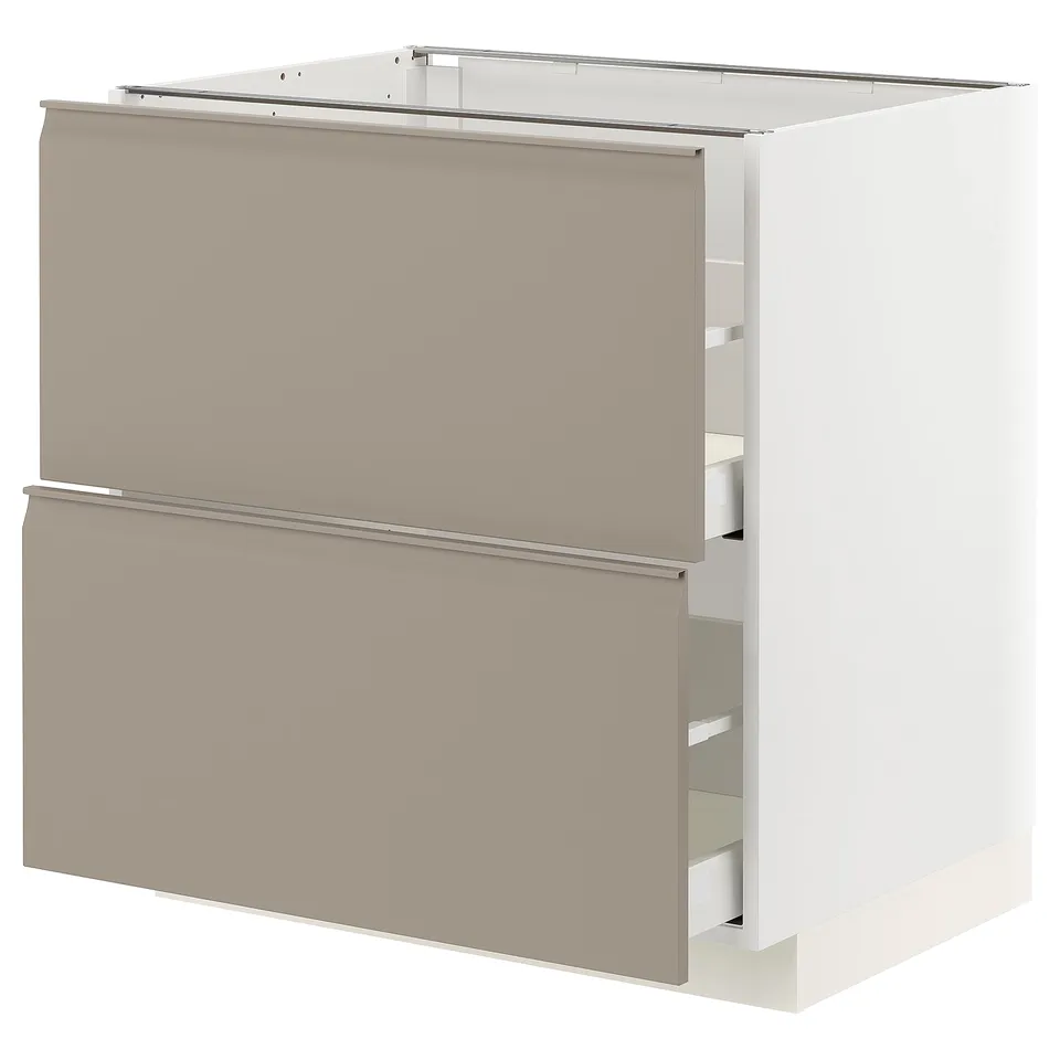 An off-white METOD kitchen cabinet with two grey-beige drawers and a modern design. It has integrated handles and smooth, full-extension drawers.