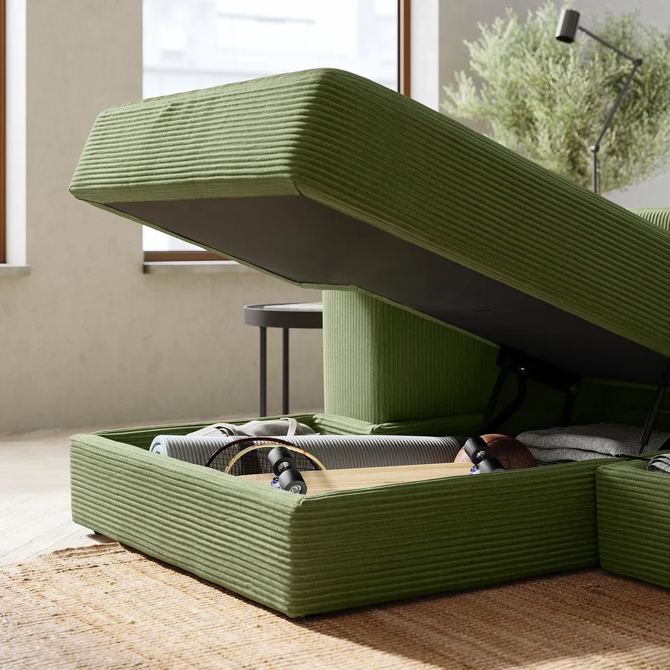 Modern olive-green JÄTTEBO modular sofa with storage, textured fabric, clean lines, and adjustable cushions.