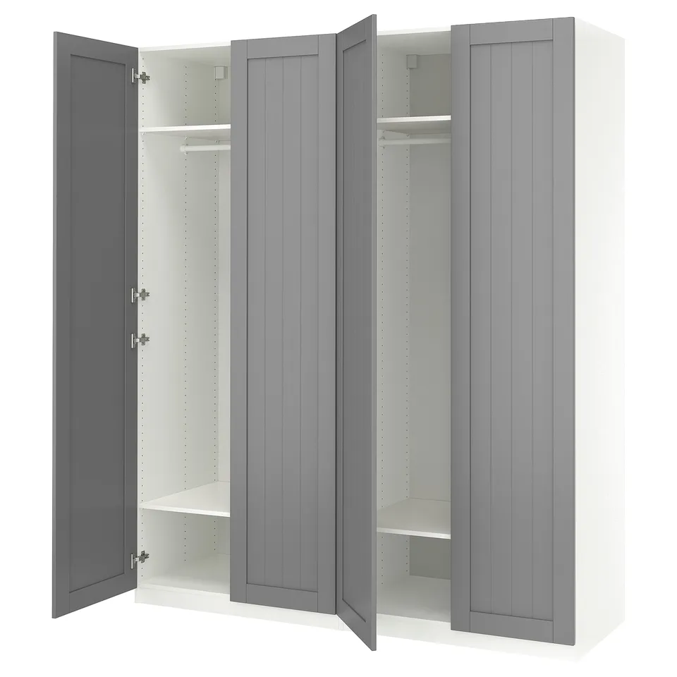 A grey PAX wardrobe with open doors, revealing inner shelves and a rail.