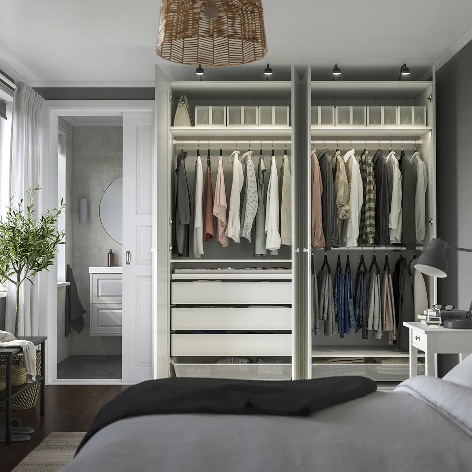 Modern bedroom with built-in wardrobe and efficient storage solutions.