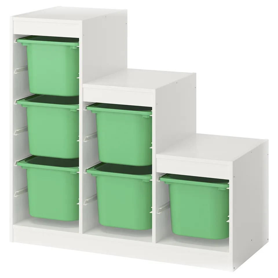 A white TROFAST storage unit with green plastic bins. It has multiple shelves for organising items.