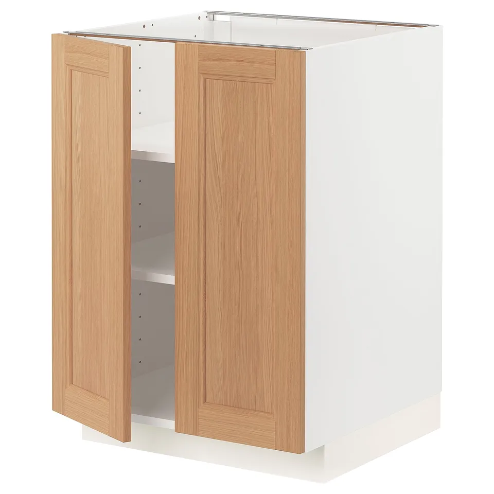 An open light oak cabinet from the METOD kitchen system, featuring adjustable shelves and a modern design.