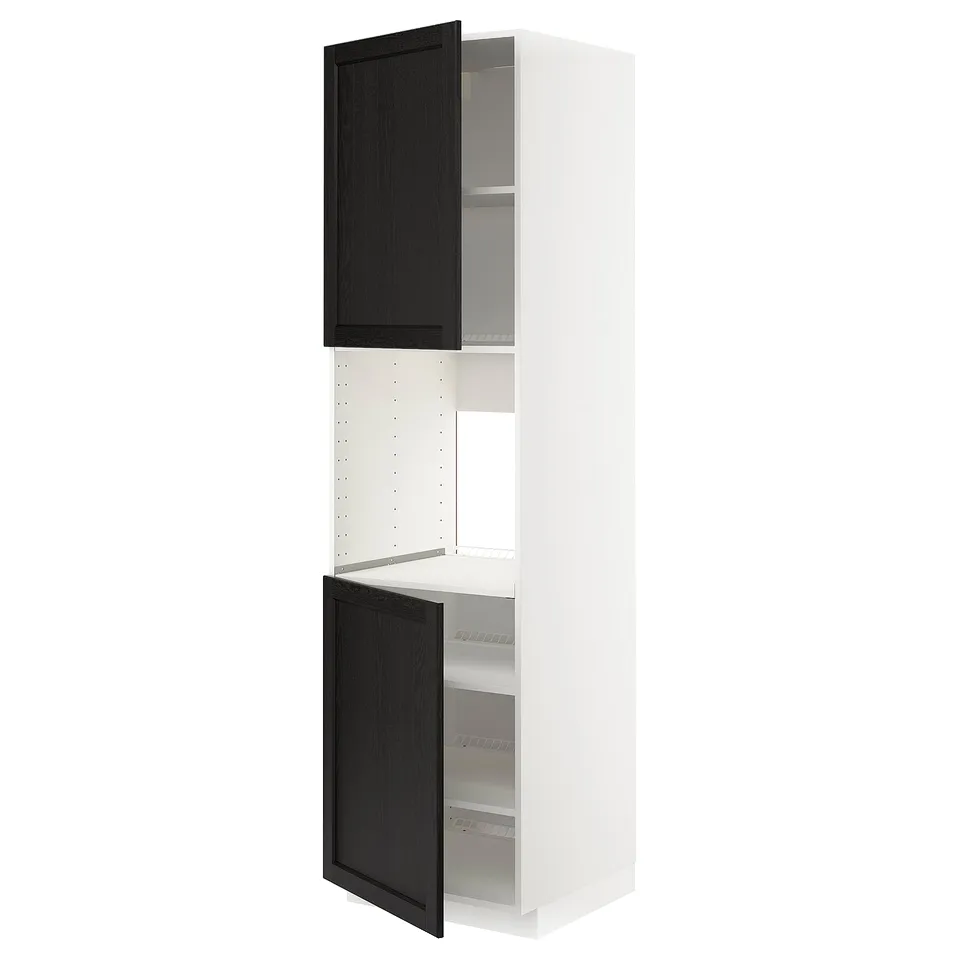 A white and black ikea METOD kitchen cabinet. It has open black doors with beveled edges and adjustable shelves inside.