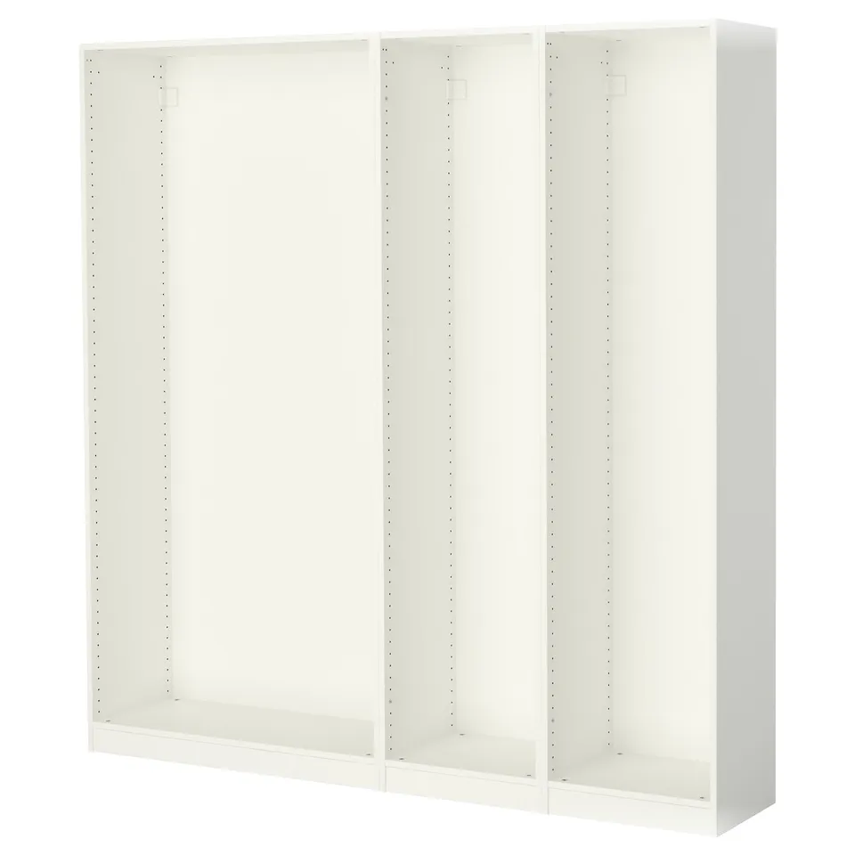 IKEA PAX wardrobe: white, modular, with multiple compartments for storage, featuring adjustable feet for floor levelling.