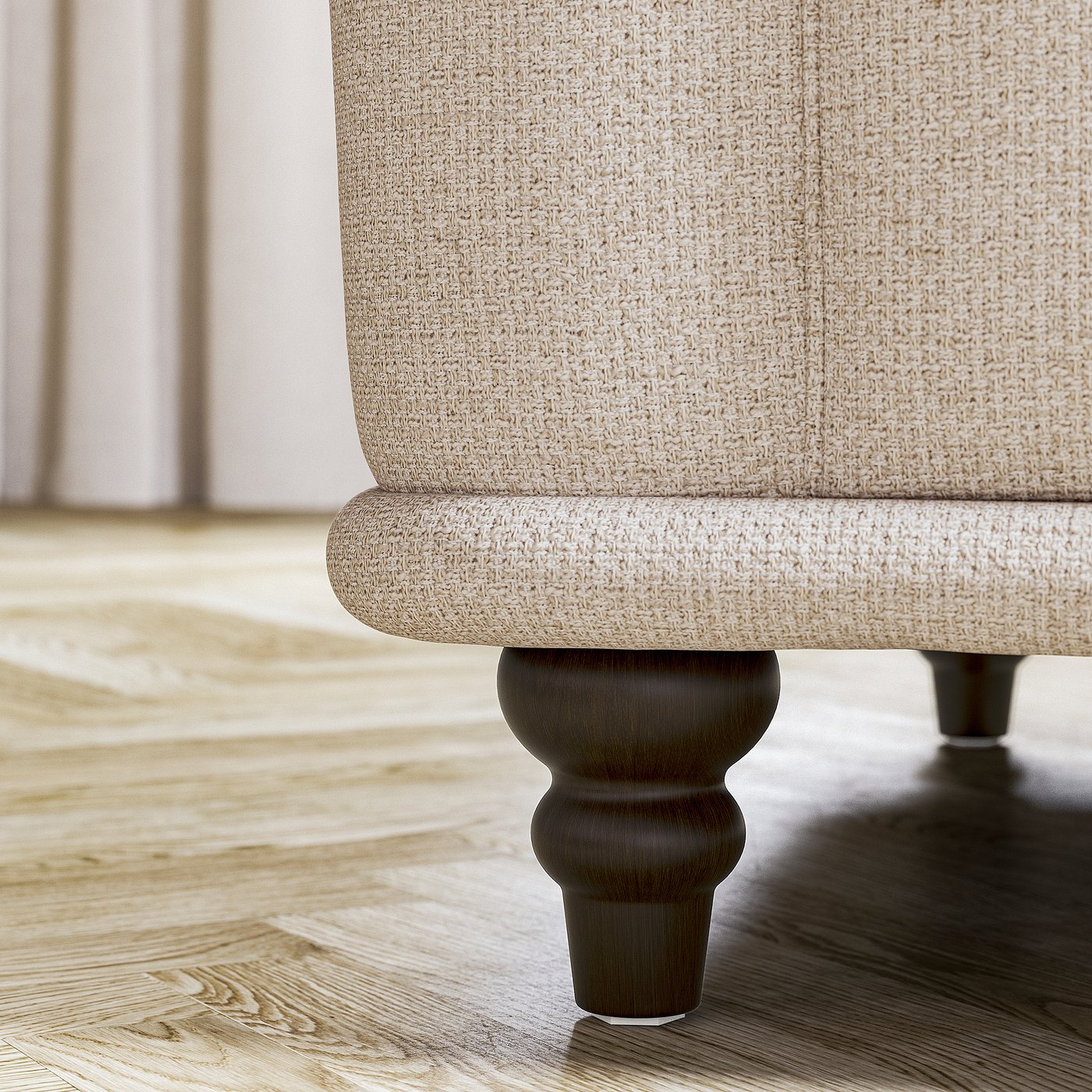 Close-up of beige VISKAFORS armchairs turned leg.