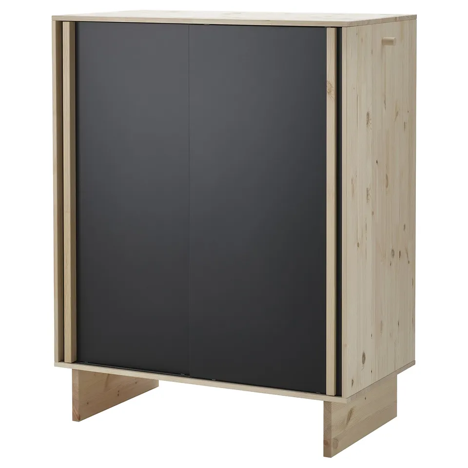 The GLAMBERGET wardrobe in light wood and dark grey. Its designed for storage, with adjustable shelves and a central dividing function.